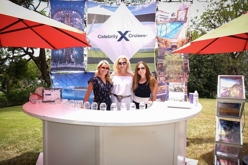 Guests at a Celebrity Cruises outdoor event display
