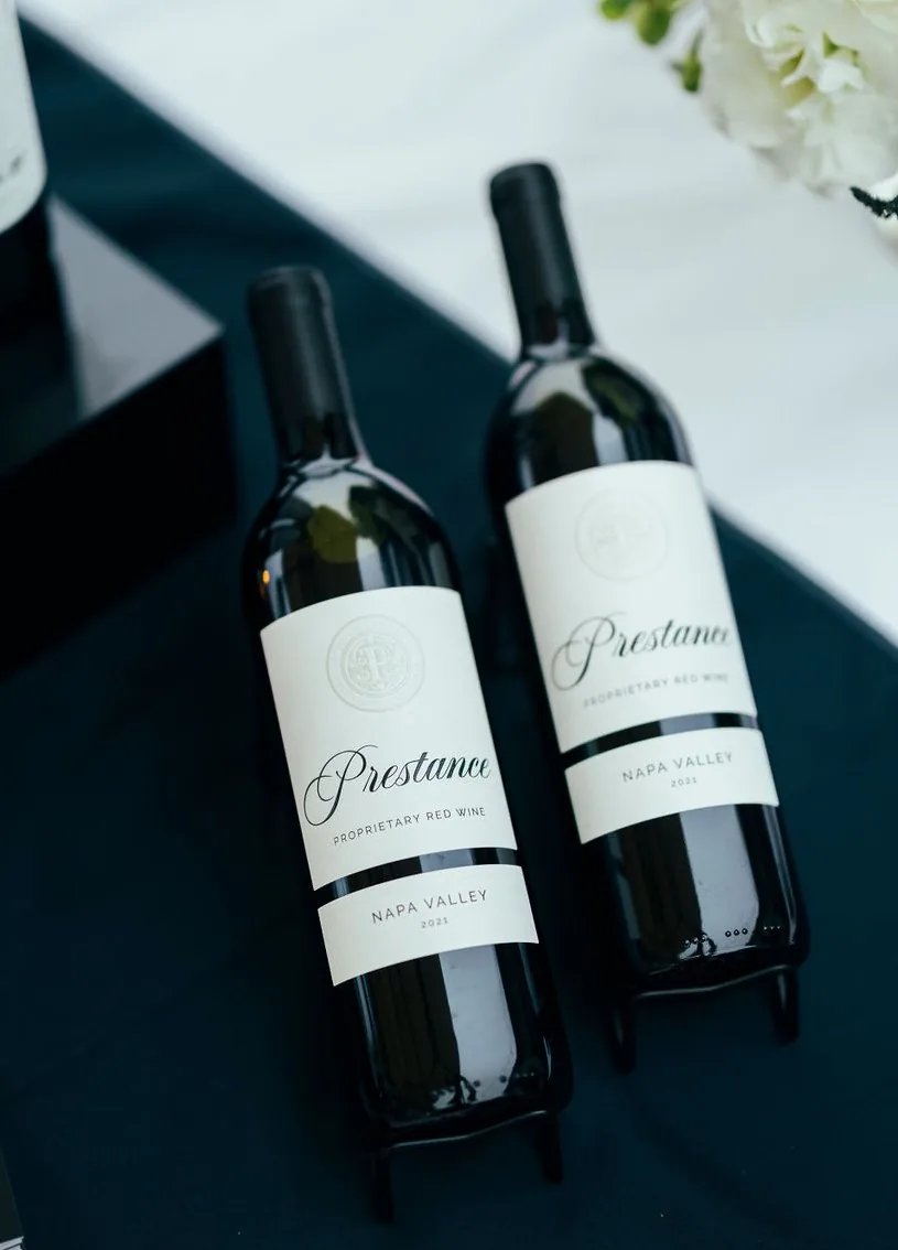 Two bottles of Prestance Napa Valley wine on a table